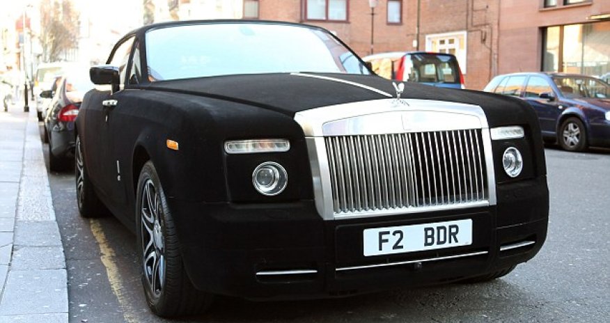 Rolls Royce covered in BLACK VELVET is spotted outside Harrods