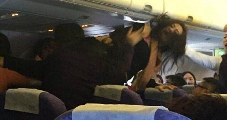 Pilot threatens emergency landing after...