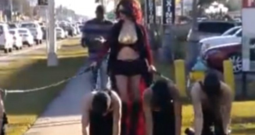 The triple-breasted woman is back!