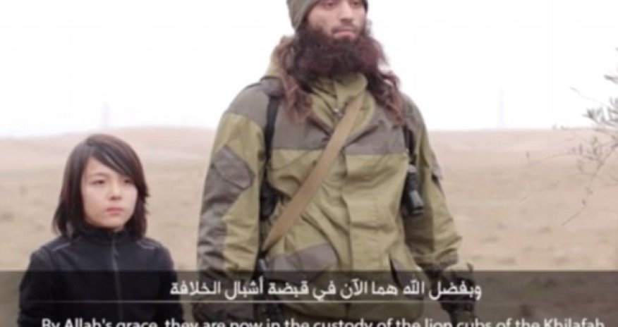 ISIS release new footage claiming to show a child executing two Russian 'spies'