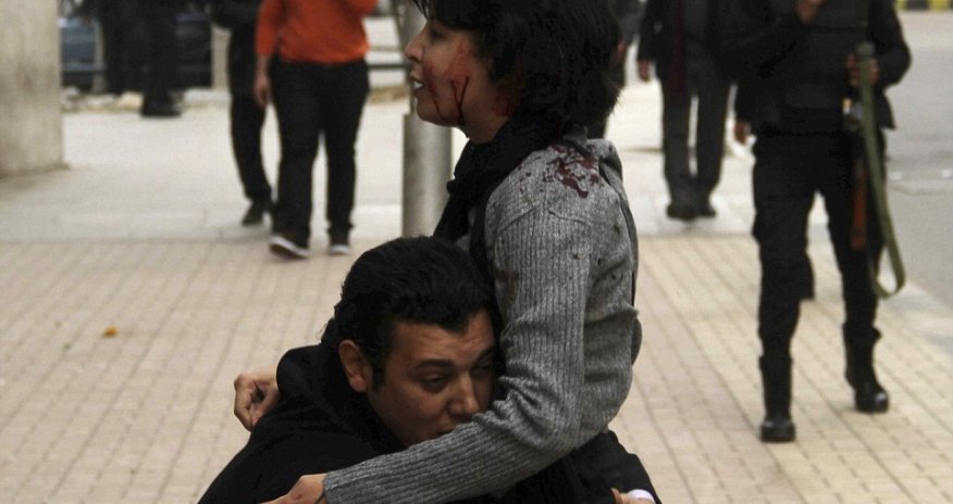 Mourners gather to bury mother, 32, gunned down by Cairo police