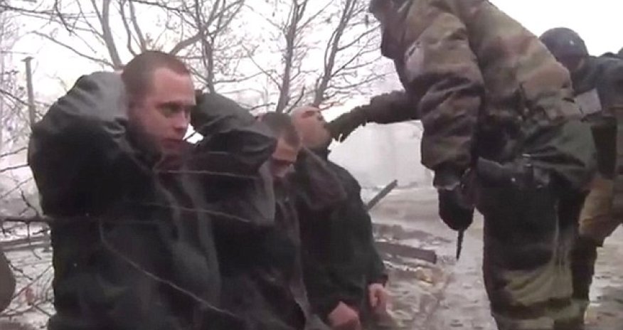 Ukrainian soldiers' forced to EAT their uniform