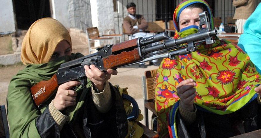 Women trained to use Kalashnikovs and handguns… to defend their CLASSROOMS