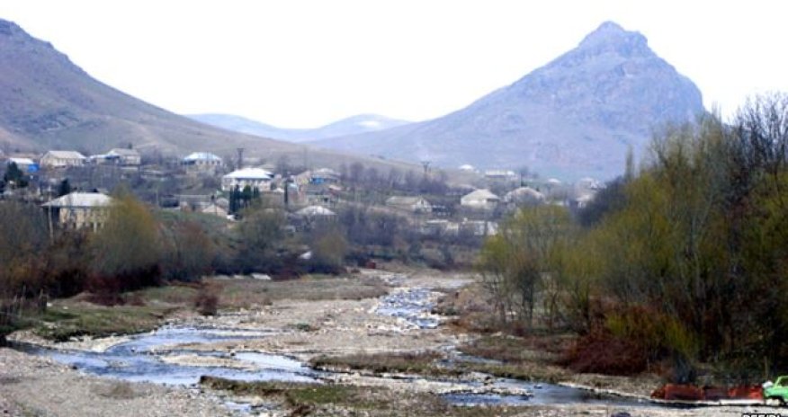 Azeri civilian injured, house burnt by Armenian fire