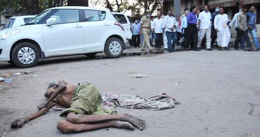 Health minister ignores dying man lying outside hospital