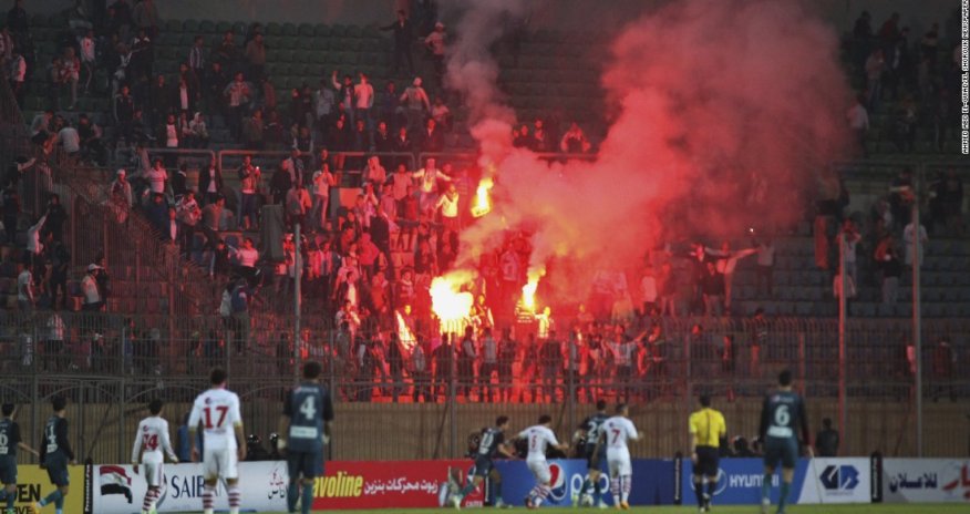 Soccer fans clash with the police in Cairo; at least 19 dead