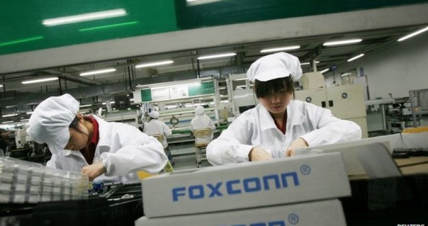 Apple bans 'bonded servitude' for factory workers