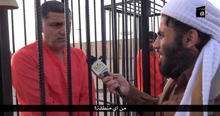 Twisted new ISIS video shows 'Kurdish Peshmerga' fighters paraded in cages