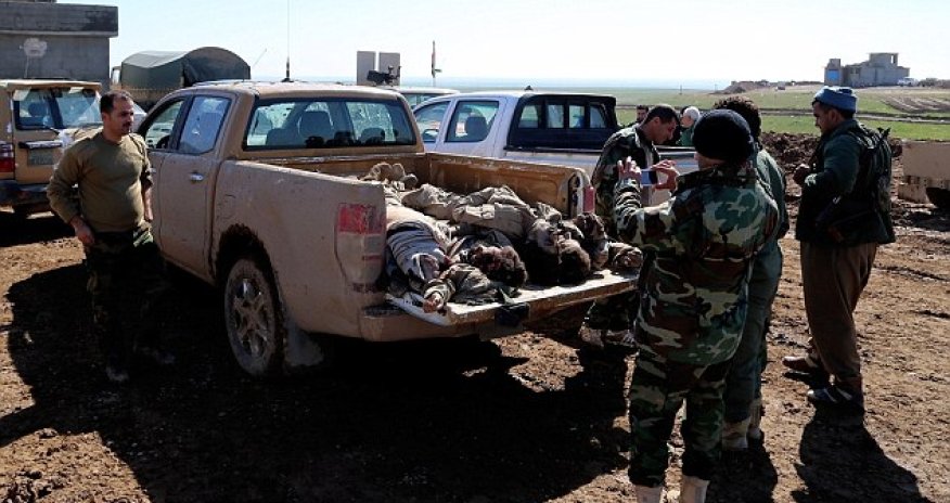 Bodies of ISIS terrorists piled onto pickup truck