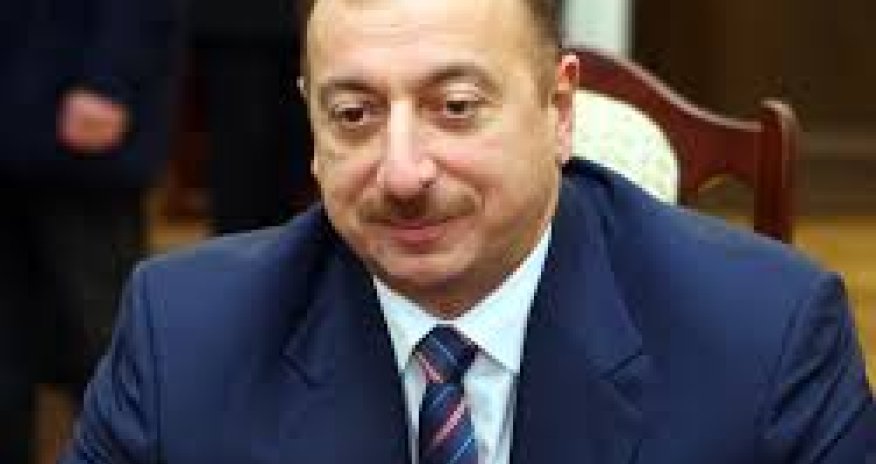 Azeri president calls manat's devaluation necessary measure