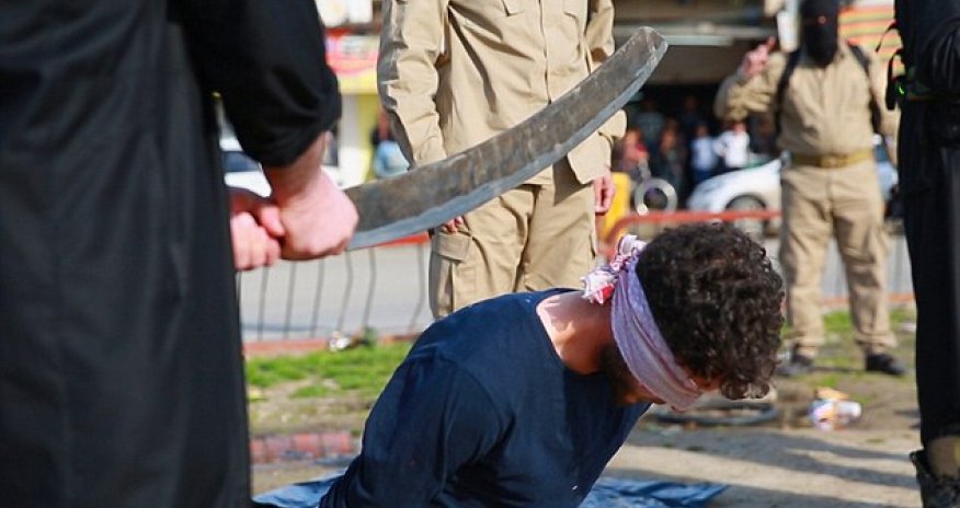 Three men are beheaded with blood-covered sword by ISIS