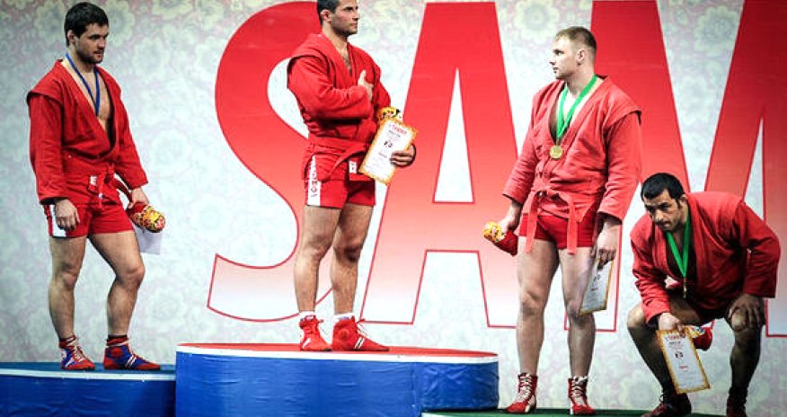 Azeri athlete may have medal stripped for squatting as Armenian anthem played