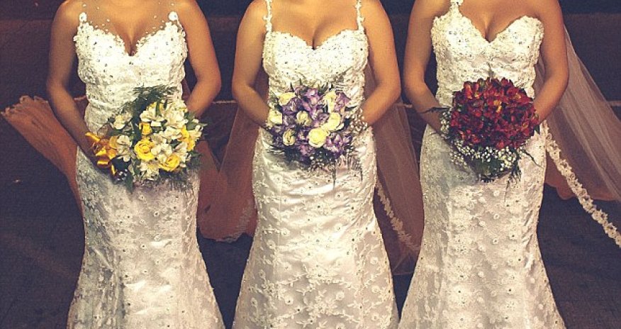 Identical triplets married on the same day at the same time