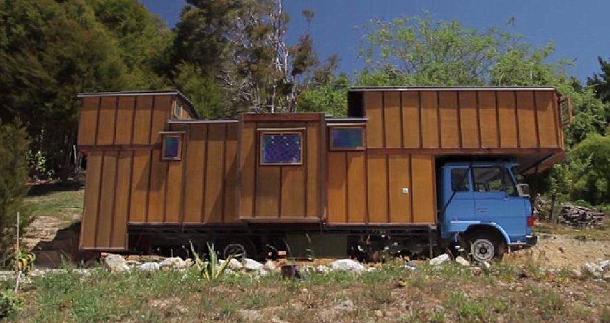 Couple converts 30-year-old flatbed truck into two bedroom solar
