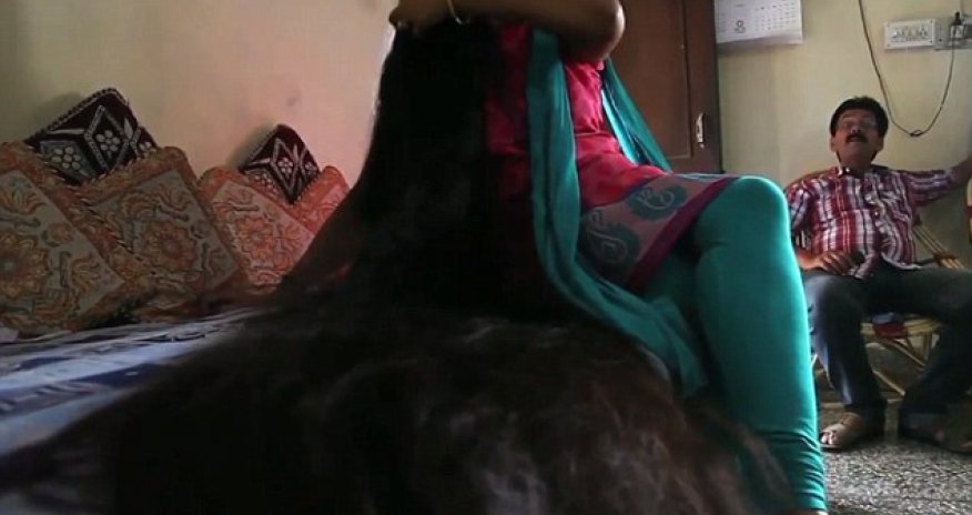 Woman with seven-foot-long hair dreams of one day becoming Guinness World Record holder