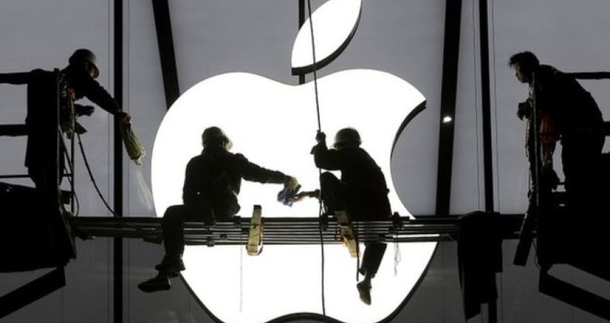 Apple to return more cash to investors as profits soar