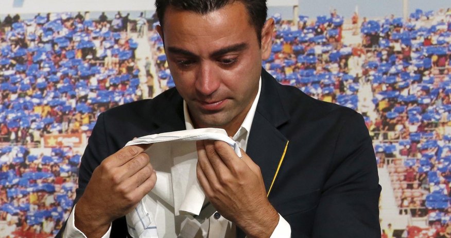 Barcelona's Xavi weeps during farewell tribute