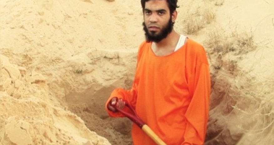 Prisoner forced to dig his own grave in the desert