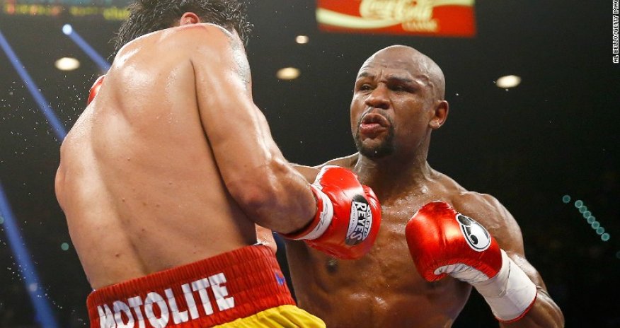 Floyd Mayweather and Manny Pacquiao punch above weight
