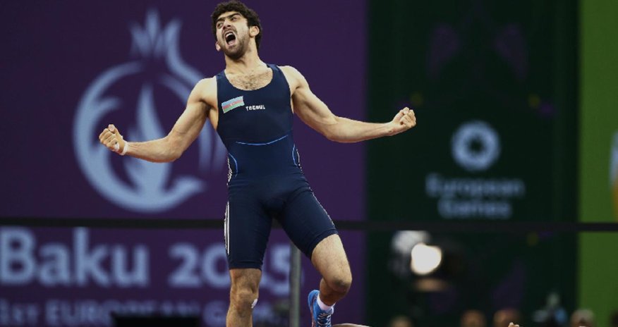Fans roar as Azerbaijan wrestlers match Russia