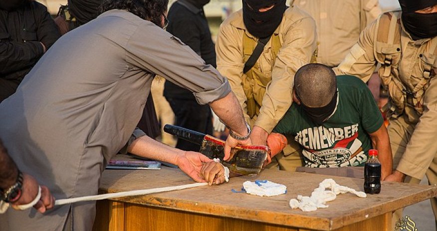 Blindfolded, pinned down and butchered with a MEAT CLEAVER