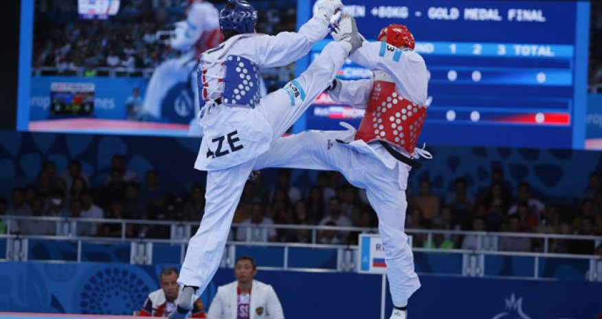 Joker Isaev keeps cool head to land Taekwondo gold for hosts