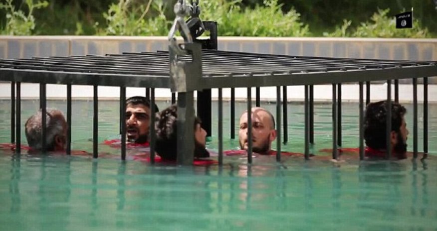 Sickening new ISIS video shows caged prisoners