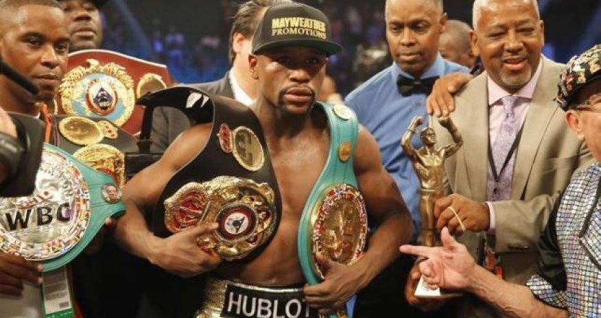 Mayweather stripped of title he won in Pacquiao fight
