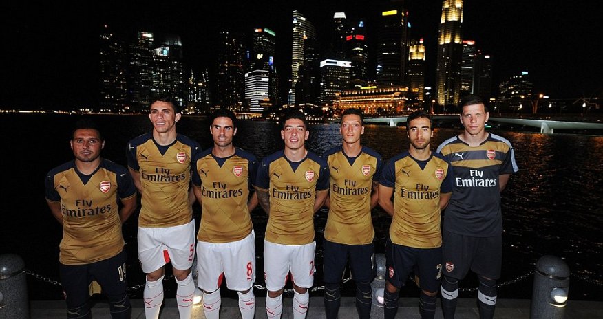 Arsenal release new gold and navy away strip at Singapore kit launch