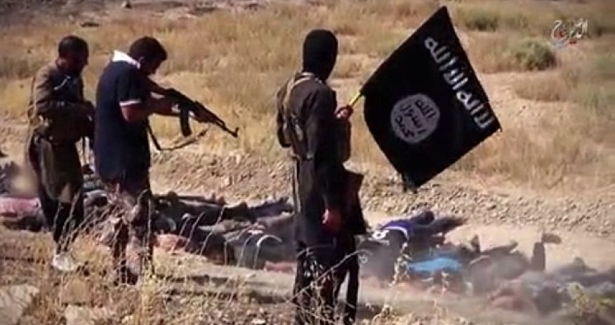 ISIS child executioner ignores prisoners' pleas to spare them