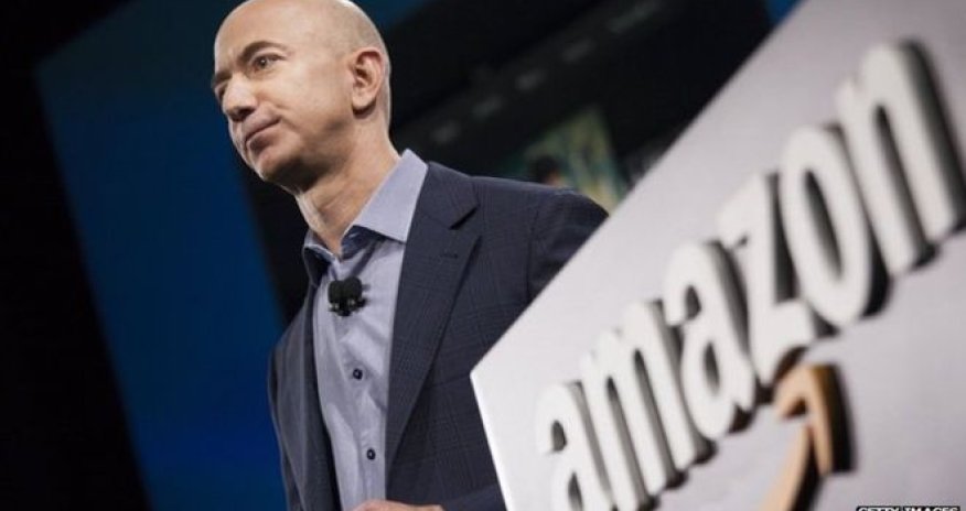 Amazon shares surge after surprise profit