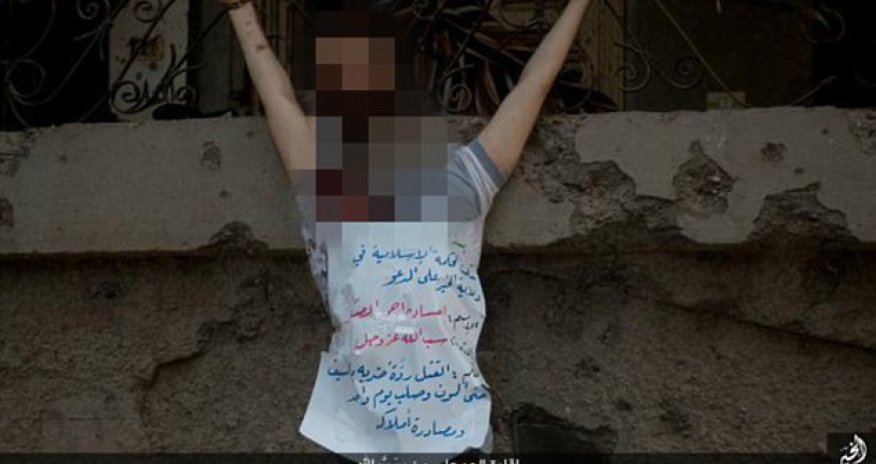 ISIS thugs behead blindfolded man and crucify his corpse ...