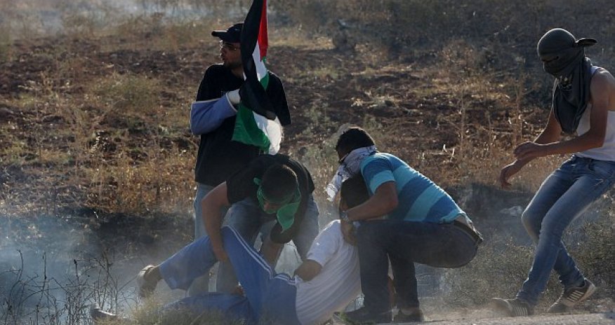 Palestinian youth shot dead by Israeli troops during protest