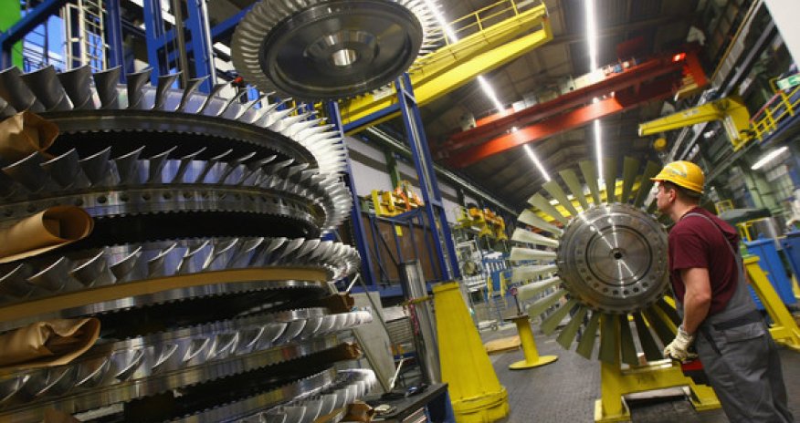 German economy expands less than forecast as global risks loom