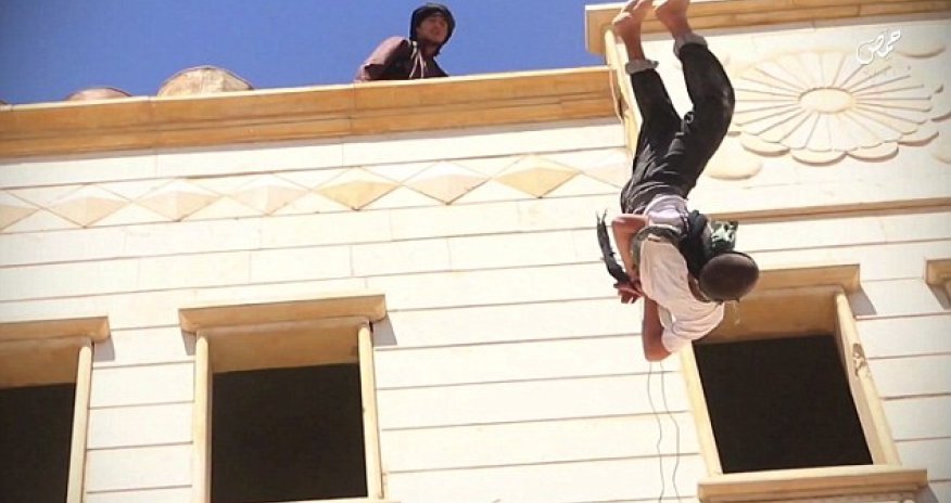 Two gay men are thrown off tall building by ISIS