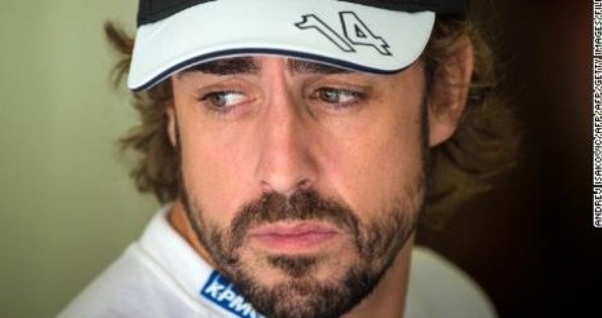 Fernando Alonso: I stayed at 'sad' Ferrari too long