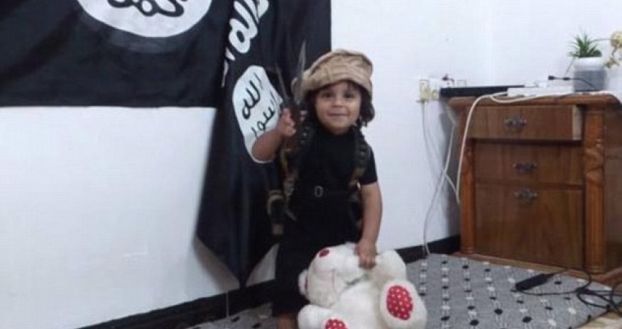 Shocking new ISIS video shows baby-faced three-year-old boy behead his TEDDY BEAR