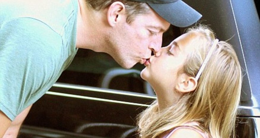 Psychologist slams doctor's advice not to kiss their children on the lips