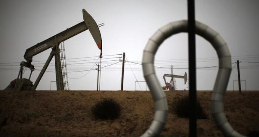 Oil turns higher as Wall Street rally offsets inventory rise