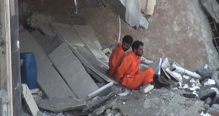 Trussed up and forced to watch the burning fuse that will kill them