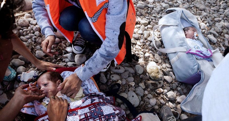 Desperate Syrian family risk the lives of their eight-month-old twins