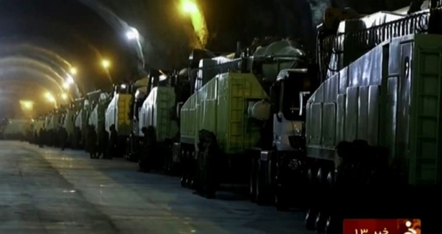 Iran reveals underground tunnel filled with missile launchers