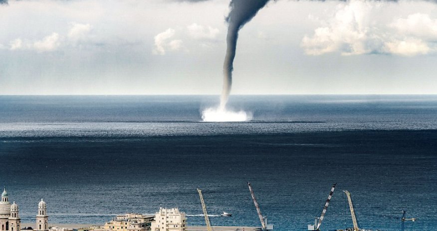Incredible moment a massive waterspout descended on Italian coastal town