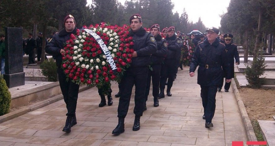 Azerbaijan buries policemen killed in clash with Islamists