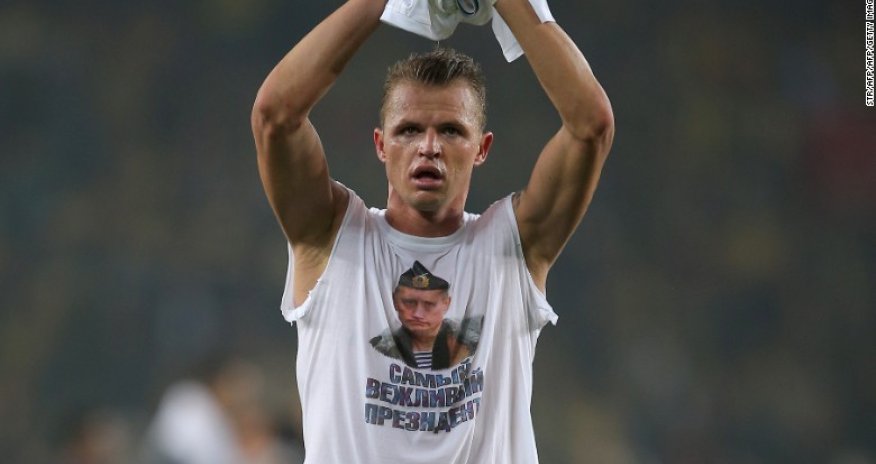 Vladimir Putin: 'Most polite President' T-shirt sparks fury at soccer game