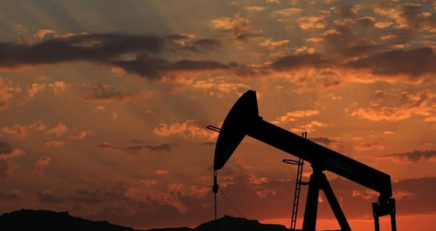 Oil prices spike on output meeting