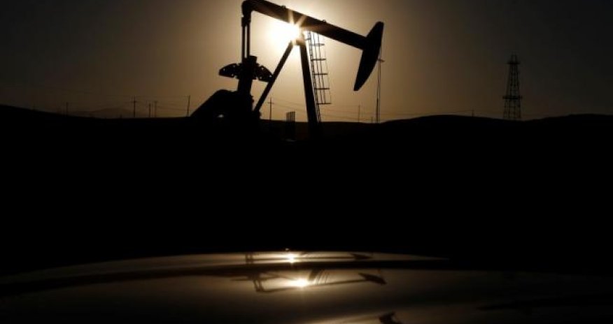 Oil jumps as yuan hits 2016 high; investors put fresh cash into oil