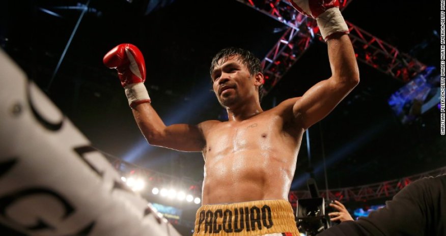 Manny Pacquiao beats Bradley, hints at retiring