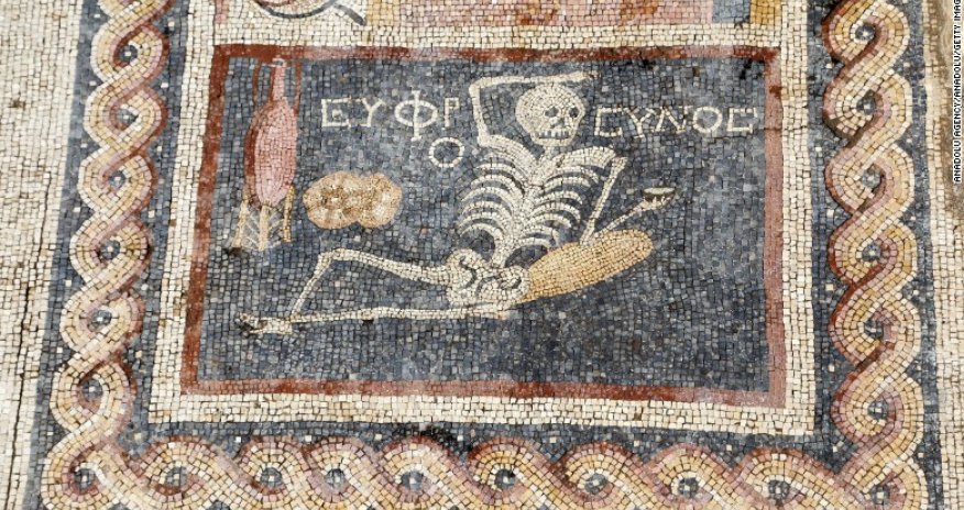 Laid-back ancient skeleton mosaic has sage advice