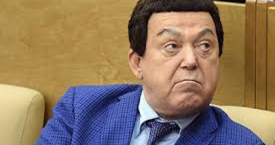 Путин вручил Кобзону медаль